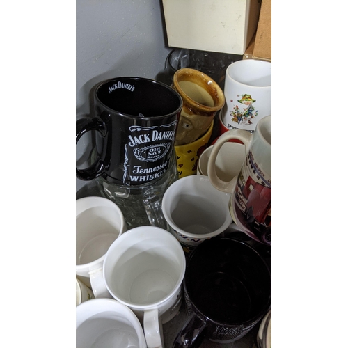 195 - A mixed lot to include various mug including Wallace and Gromit character and others together with m... 