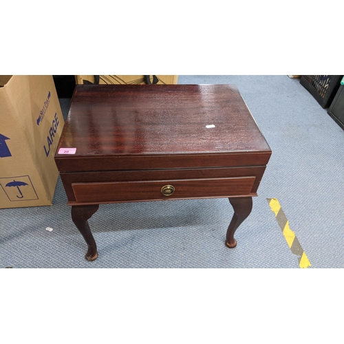 20 - A late 20th century mahogany cutlery table containing mixed Kings pattern gilded cutlery
Location:A1... 