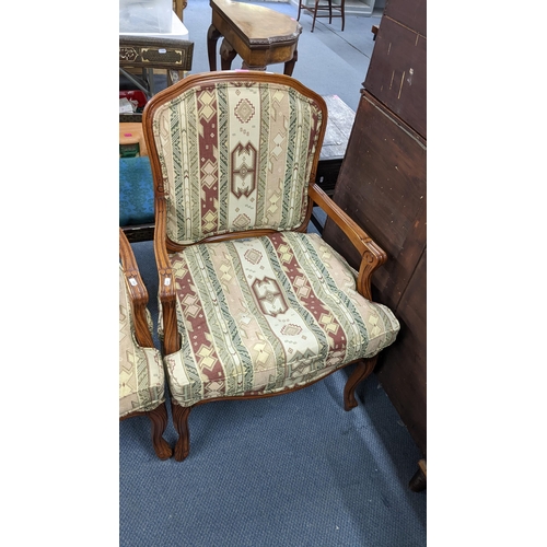 206 - A pair of French style walnut armchairs standing on cabriole legs Location:A3B