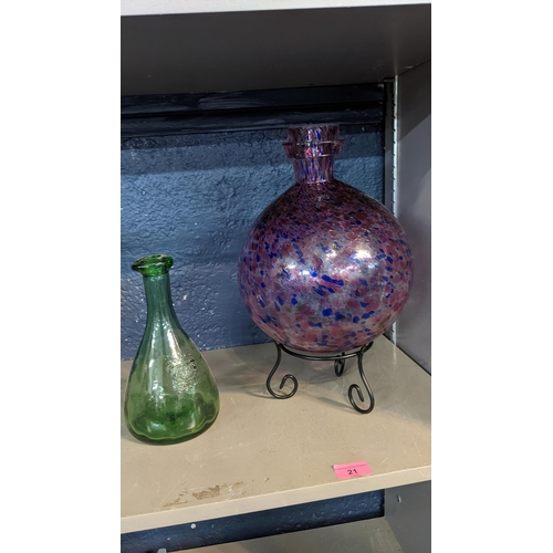 21 - A Murano style art glass vase on a wrought metal base, together with a glass mallet vase
Location:3:... 