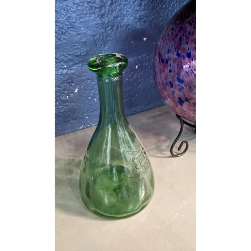 21 - A Murano style art glass vase on a wrought metal base, together with a glass mallet vase
Location:3:... 