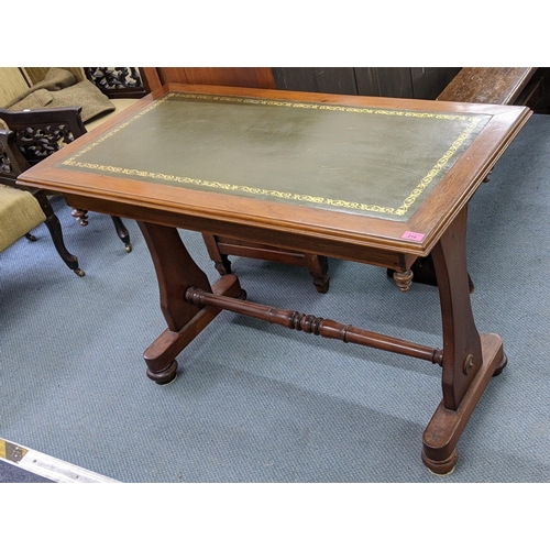 216 - A Victorian writing table having a leather topped scriber and supported by a single column 75cm h x ... 