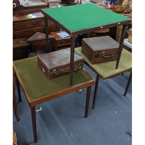 218 - Three early 20th century folding card tables, together with two brown leather cases Location:A3M