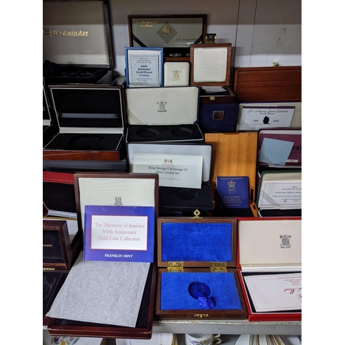 31 - A collection of empty wooden and other coin cases
Location:G