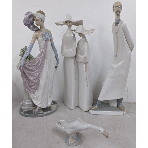 322 - Four Lladro porcelain ornaments to include a Doctor, Art Deco lady, two nuns and a goose
Location:6.... 