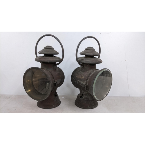 393 - A pair of early 20th century French vehicle lamps, brass plates attached 'G.Ducellier Lanternes Pari... 