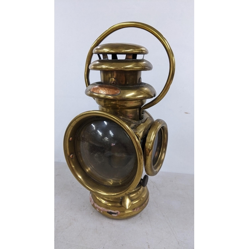 394 - An early 20th century Salsbury London brass vehicle lamp
Location: 5.1