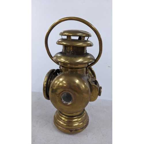 394 - An early 20th century Salsbury London brass vehicle lamp
Location: 5.1