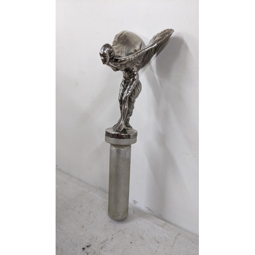 398 - A chrome plated spirit of ecstasy car mascot, inscribed Rolls-Royce Motors Limited
Location: R1.2