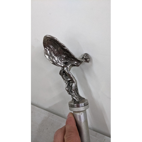 398 - A chrome plated spirit of ecstasy car mascot, inscribed Rolls-Royce Motors Limited
Location: R1.2