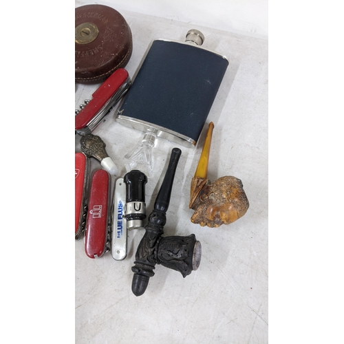 405 - A mixed lot to include pen knives, two pipes, hip flask and other items
Location; RAM