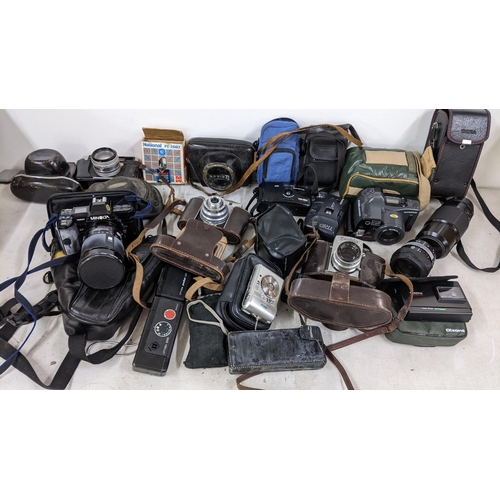 408 - Mixed cameras and accessories to include a Minolta 7000, Exakta, Olympus and others
Location: A1B