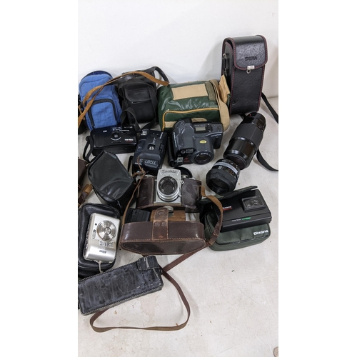 408 - Mixed cameras and accessories to include a Minolta 7000, Exakta, Olympus and others
Location: A1B