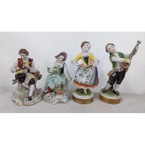 49 - A pair of late 19th century German Vokstedt porcelain figures together with a pair of Studentzdorf f... 