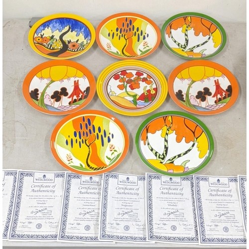 66 - A small collection of Wedgwood - Clarice Cliff collectors plates along with certificate of authentic... 