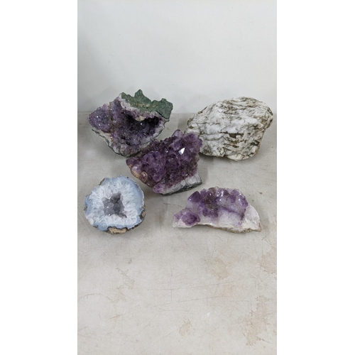 72 - Three large purple amethyst clusters, approx 12cm h x 18cm w, 9.5cm h x 18cm w, 7cm h x 17cm w toget... 