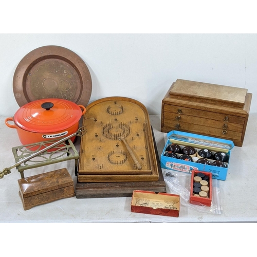 96 - A mixed lot to include Le Creuset cooking pot, a vintage bagatelle board and balls, carpet bowls and... 