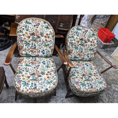 245 - Two Ercol fleur-de-Lys open armchairs with tapestry printed style loose seat and back cushions
Locat... 