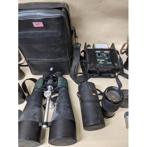 327 - A selection of glass binoculars and field glasses, camera lens, and other items to include a Visiona... 