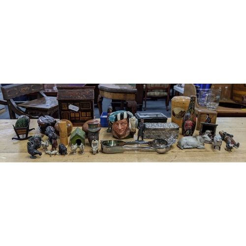 215 - Small collectables to include enamel pin badges, a Royal Doulton miniature Toby Jug, lead figures an... 