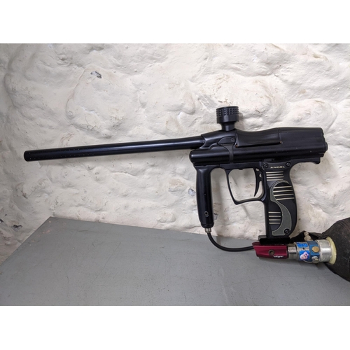 279 - Redz Gear paintball gun with 'dye rhino cover' covering the gas canister with a protective foam case... 