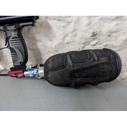 279 - Redz Gear paintball gun with 'dye rhino cover' covering the gas canister with a protective foam case... 