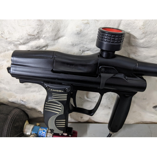 279 - Redz Gear paintball gun with 'dye rhino cover' covering the gas canister with a protective foam case... 