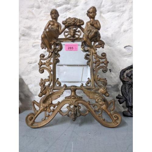 285 - Mixed 19th Century and later collectables to include a cast iron picture frame, a figure plaque and ... 