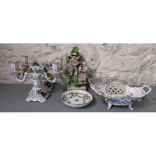 287 - Early 20th century German ceramics to include a pair of candelabra, three dishes and a 19th century ... 