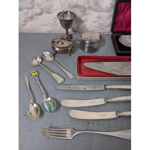 288 - Silver plated flatware and other items along with a pair of silver salts, silver handled flatware
Lo... 