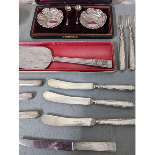 288 - Silver plated flatware and other items along with a pair of silver salts, silver handled flatware
Lo... 