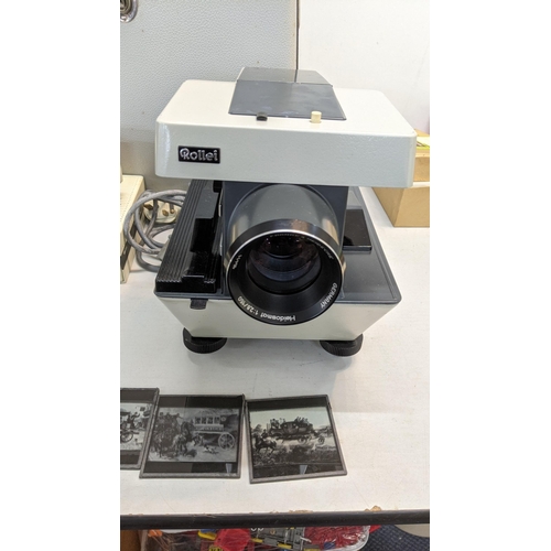 309 - A Rollei Heidosmat 128/150 Franke and Heidecke film projector together with Victorian and later slid... 