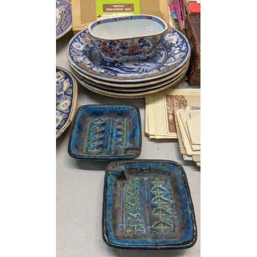 310 - A mixed lot to include blue and white dinner plates and platters together with a collection of mixed... 