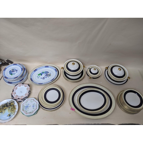 33 - Soho pottery part dinner service decorated with a blue band
Location:G