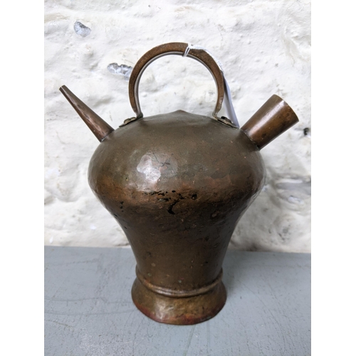 406 - An early 20th century wine flask and a Western Asian powder flask
Location: LWB