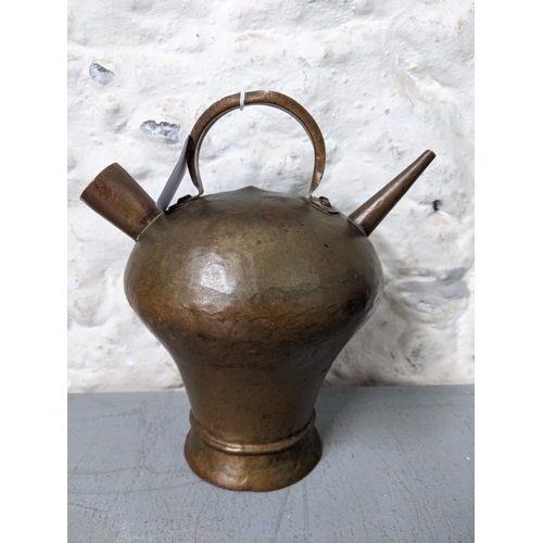 406 - An early 20th century wine flask and a Western Asian powder flask
Location: LWB