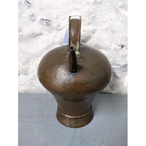 406 - An early 20th century wine flask and a Western Asian powder flask
Location: LWB