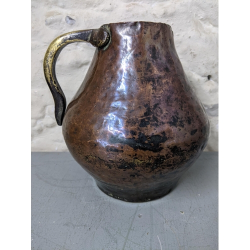 410 - An 18th century Western Asian copper and brass jug
Location: LWB