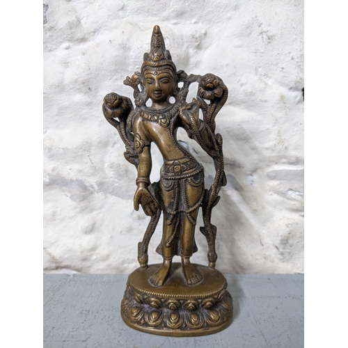 423 - An 18th/19th century Indian figure buddha deity 
Location: RWB