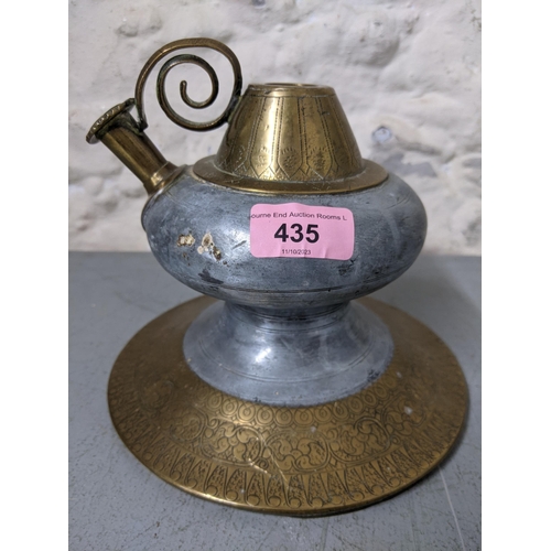 435 - A 19th century Islamic brass and pewter hookah pot
Location: LWM