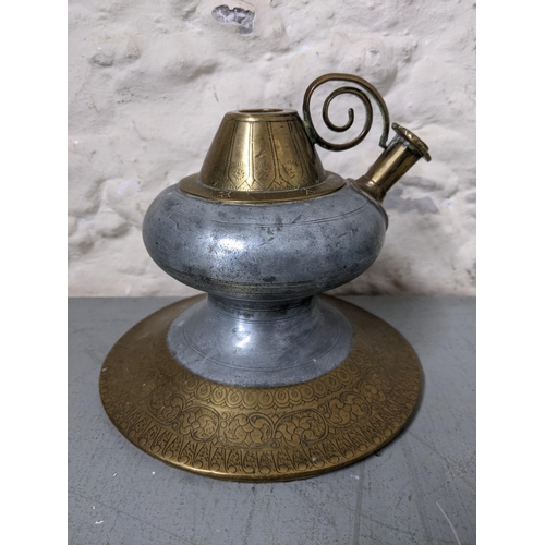 435 - A 19th century Islamic brass and pewter hookah pot
Location: LWM