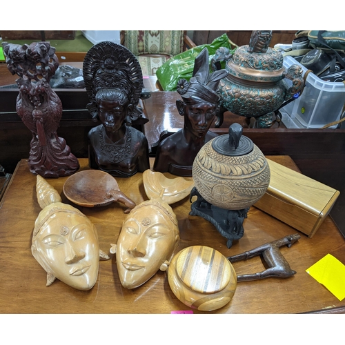 445 - A group of treen items to include African busts, boxes and masks and other items
Location: A2B