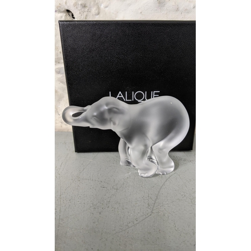 448 - A Lalique glass elephant calf with its box
Location: R2.2