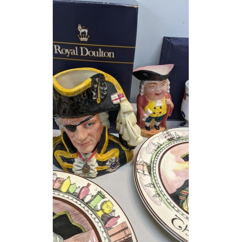 451 - A mixed lot to include Royal Doulton character jugs, Royal Doulton Dickens ware together with Royal ... 