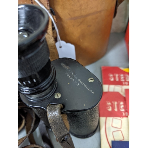 459 - Two binoculars to include an Octia No 9373 7x50 and a pair of stereo prism binoculars no 56492, and ... 