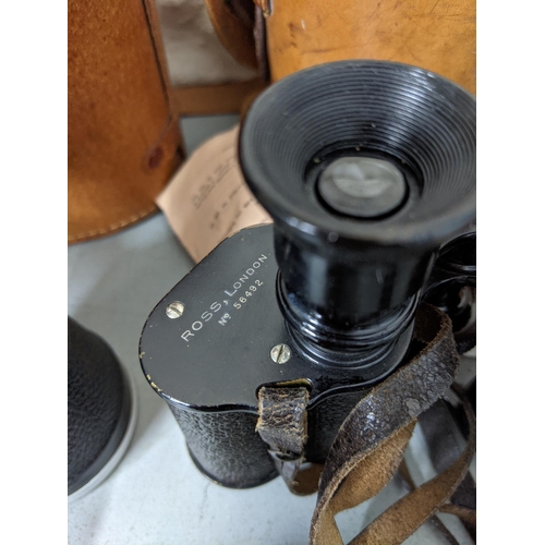 459 - Two binoculars to include an Octia No 9373 7x50 and a pair of stereo prism binoculars no 56492, and ... 