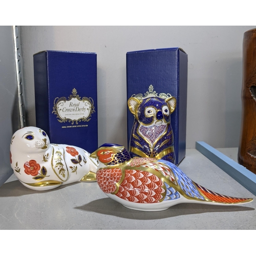 89 - Three Royal Crown Derby paperweights of model animals to include koala, seal and a pheasant 
Locatio... 