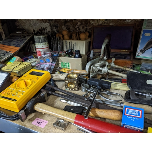 346 - A miscellaneous lot of tools, camera accessories, geometry sets, eye lens and other items to include... 