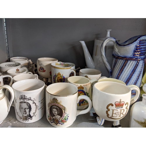 200 - A mixed lot to include ceramic and glassware, commemorative mugs, a Carltonware coffee set, a part s... 