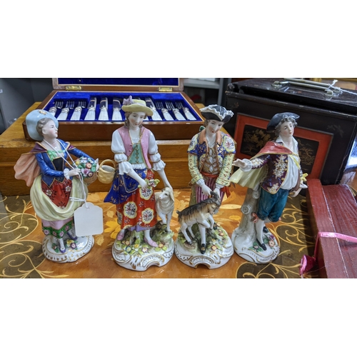 225 - Four late 19th Century, mainly German porcelain figures, in 18th Century costume 
Location:RAB